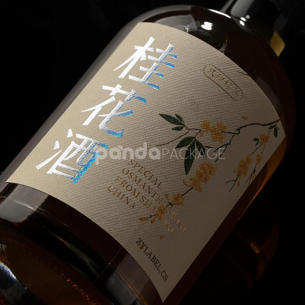 textured wine bottle labels with silver foil and floral design