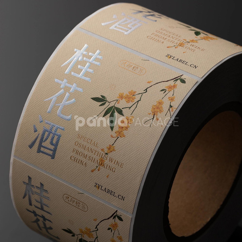 textured wine bottle labels with silver foil and floral design