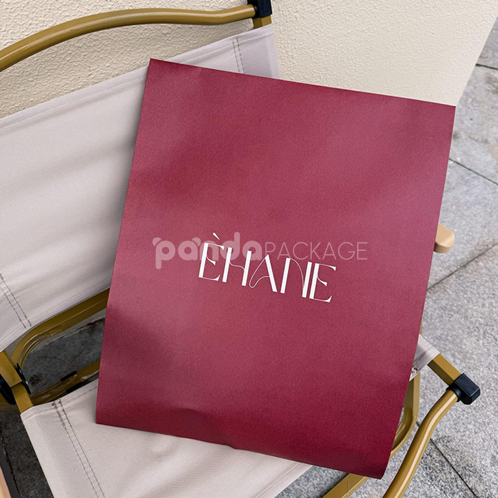 burgundy paper mailer bag for clothing shipping and packaging