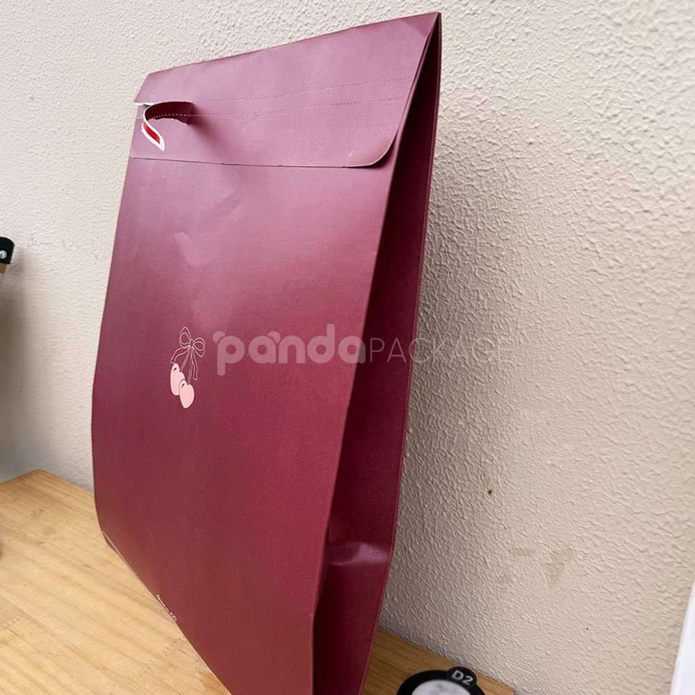 burgundy paper mailer bag for clothing shipping and packaging