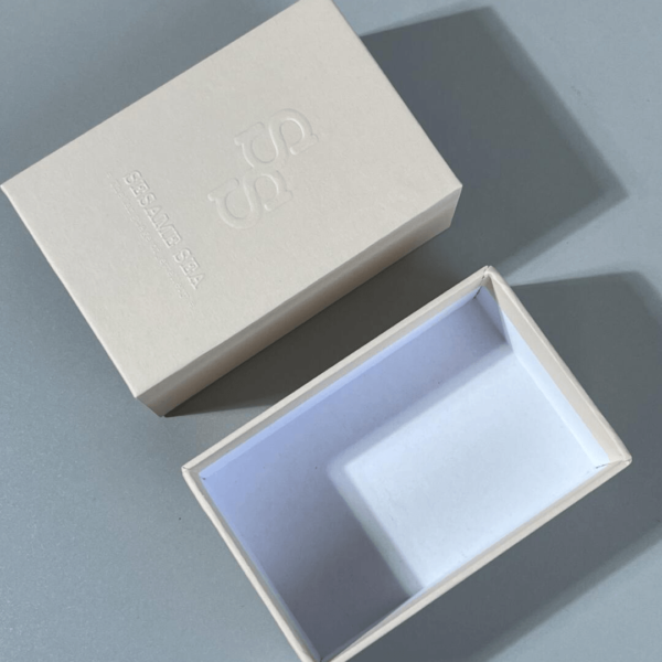 Custom Rigid Drawer Box with Embossed Logo on Textured Paper